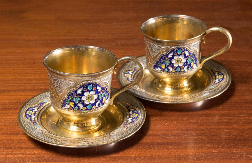 FOUR-PIECE ENAMELED SILVER TEACUP