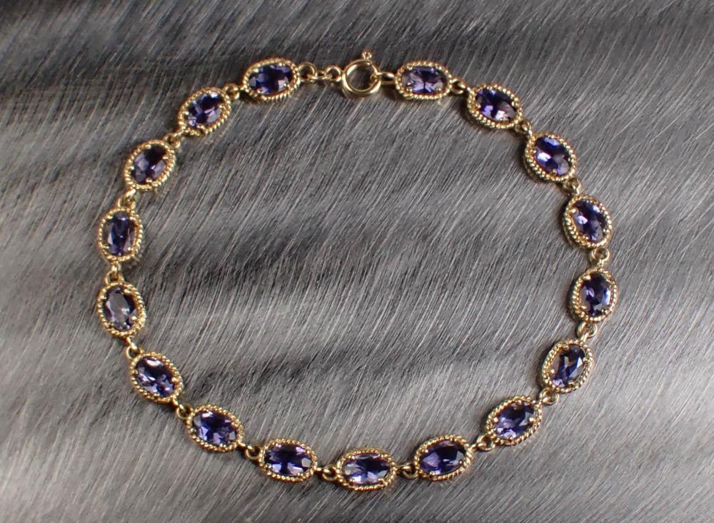 TANZANITE AND FOURTEEN KARAT GOLD 342a9b