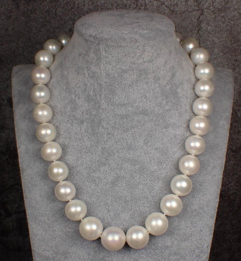 SOUTH SEA PEARL AND EIGHTEEN KARAT