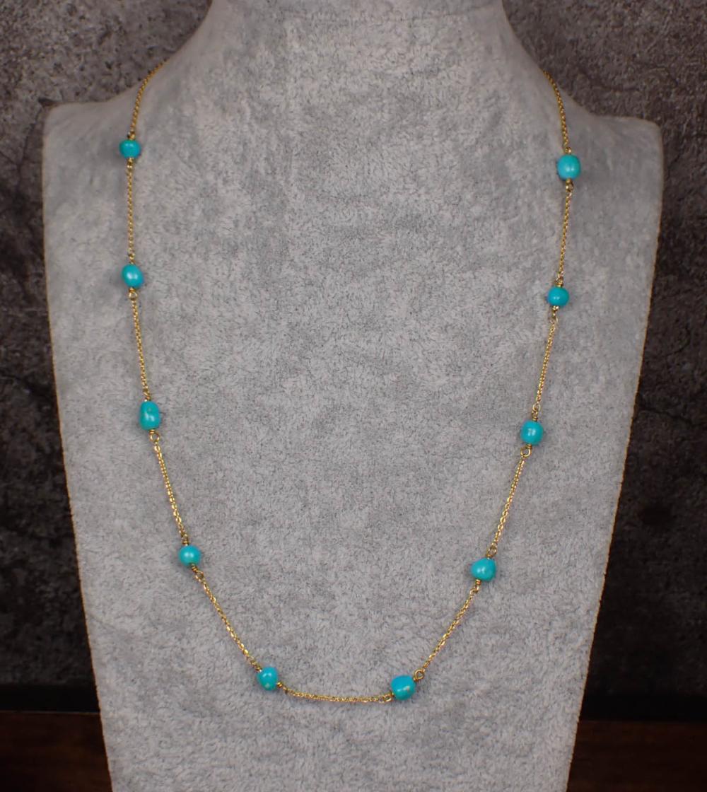 TURQUOISE AND EIGHTEEN KARAT GOLD 342ac2