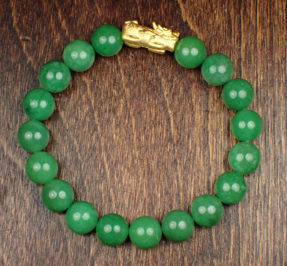 JADE AND TWENTY TWO KARAT GOLD 342bf4