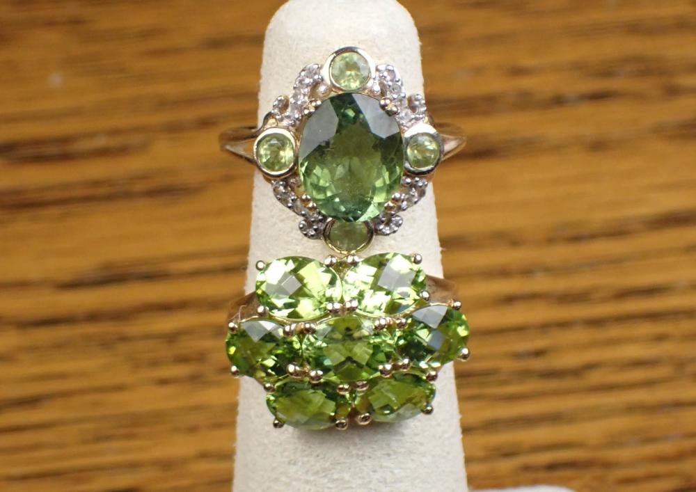 TWO PERIDOT AND YELLOW GOLD RINGSTWO 340aab