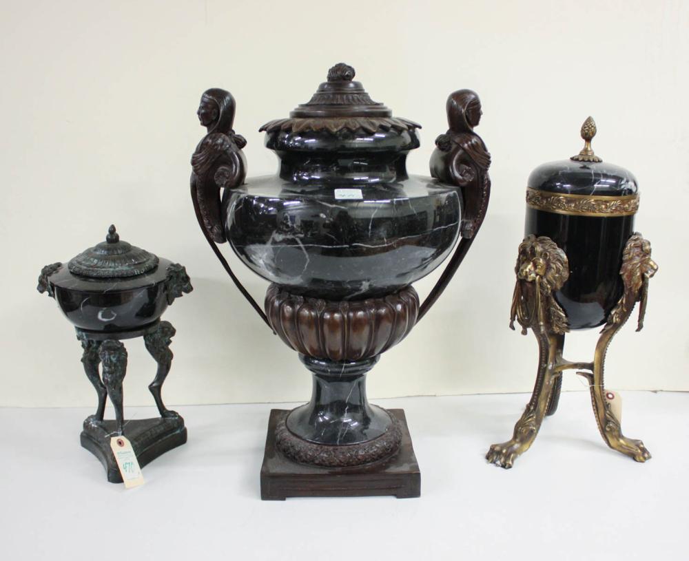 THREE BRONZE AND BLACK MARBLE COVERED