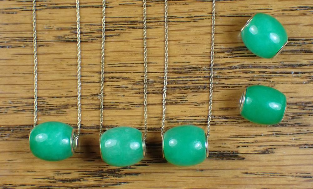 FIVE JADE PENDANT BEADS AND THREE