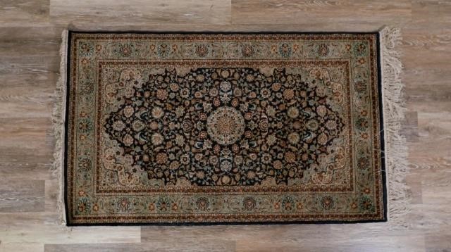 PERSIAN RUGPersian rug. Blue field