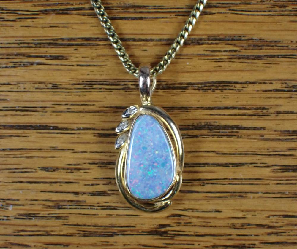 AN OPAL AND DIAMOND PENDANT NECKLACEAN