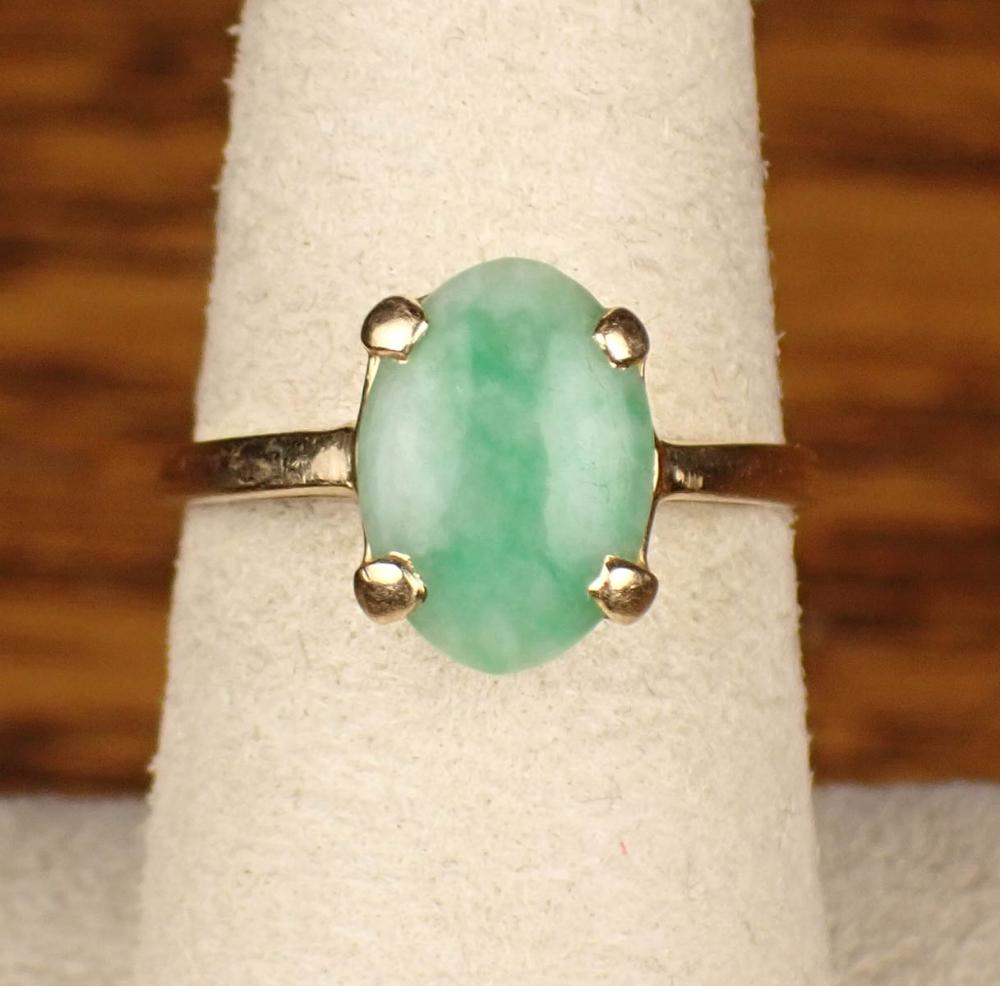 JADE AND FOURTEEN KARAT GOLD SOLITAIRE