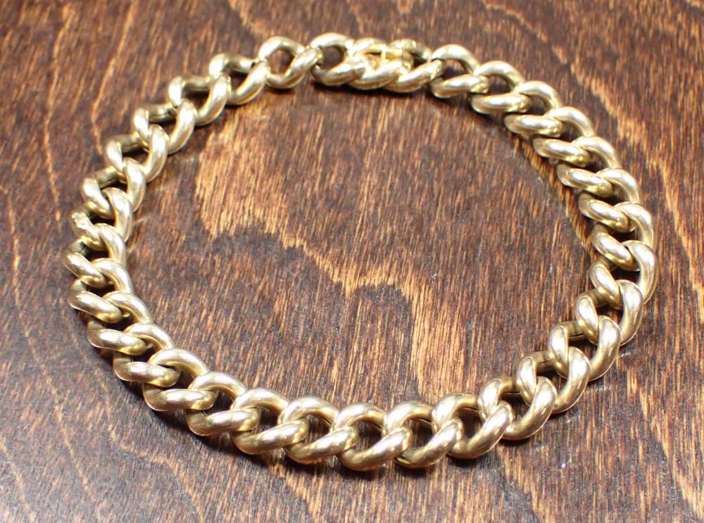 FOURTEEN KARAT YELLOW GOLD CURB