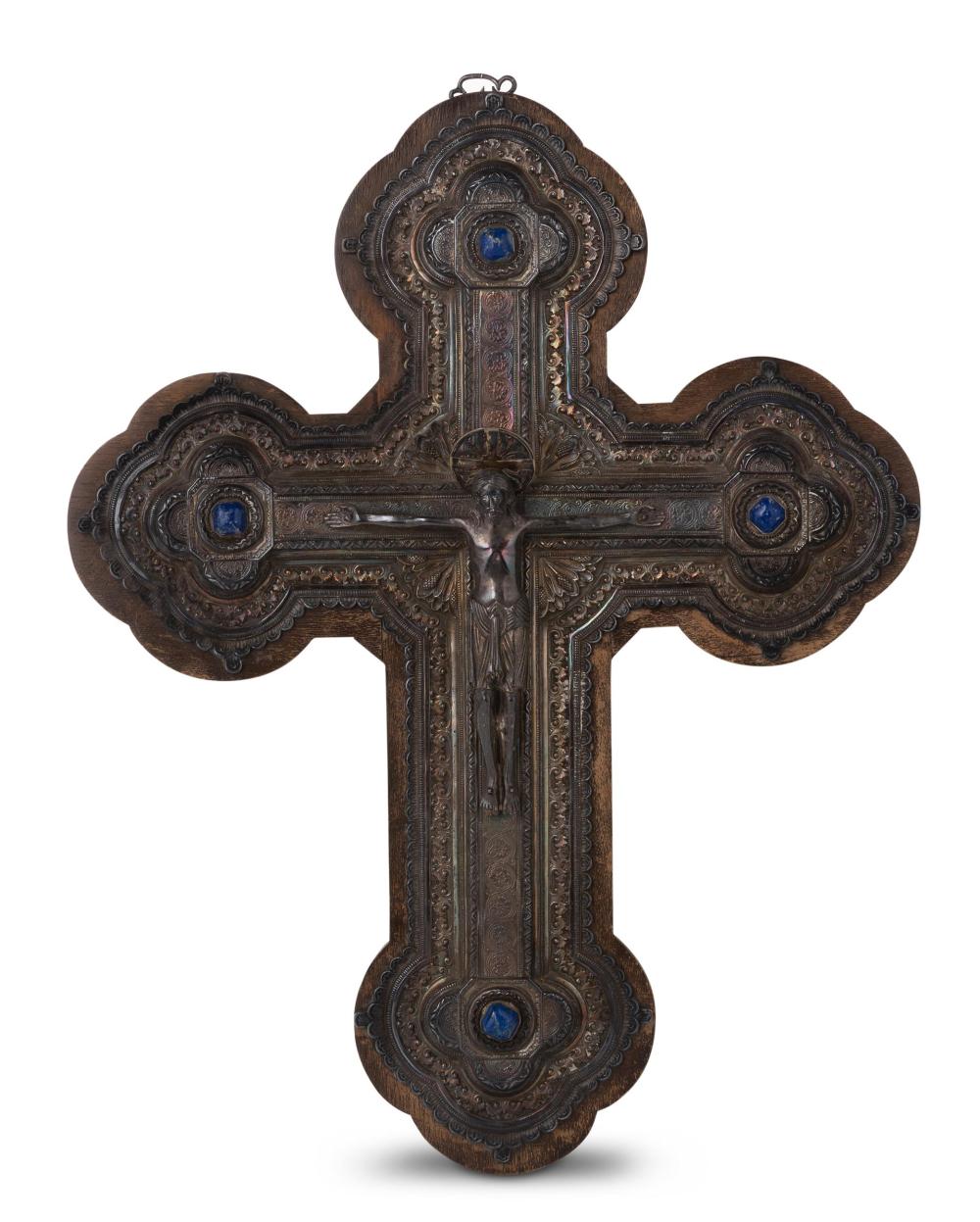 A CONTINENTAL SILVERED CRUCIFIXA