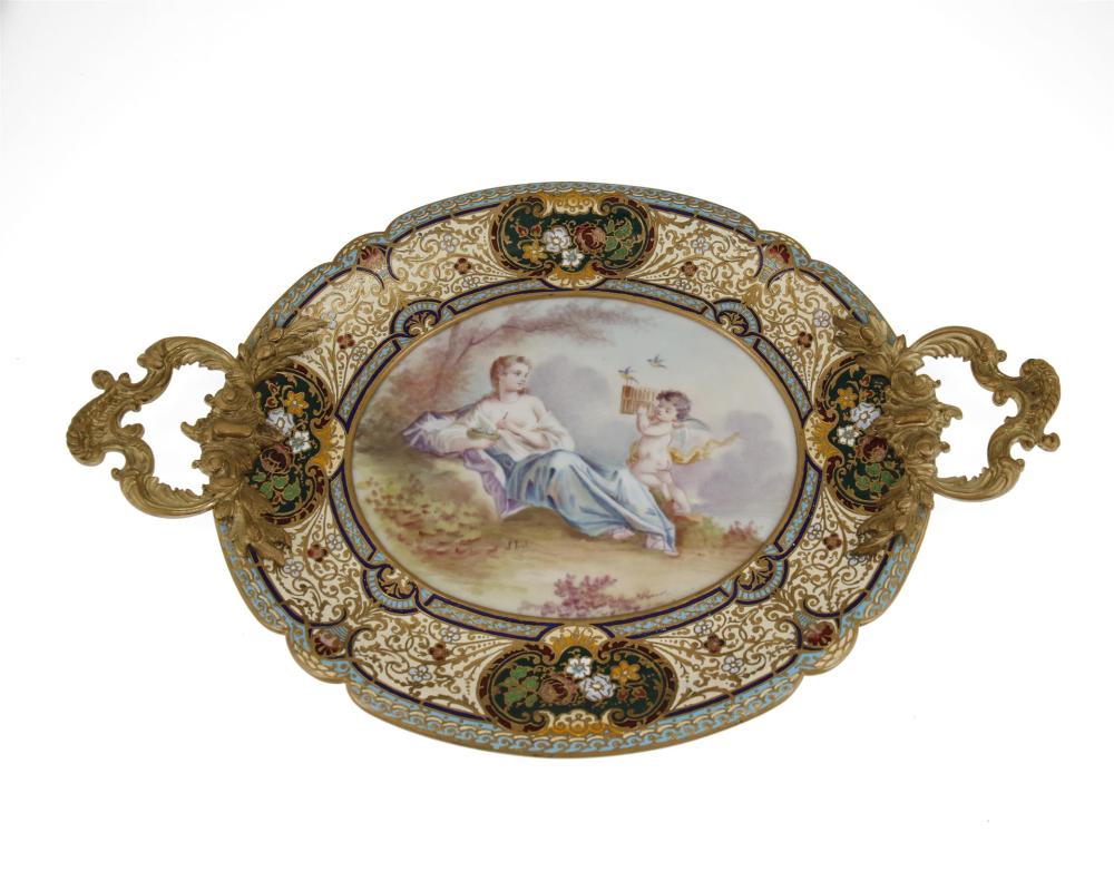 A FRENCH CHAMPLEVé AND PORCELAIN