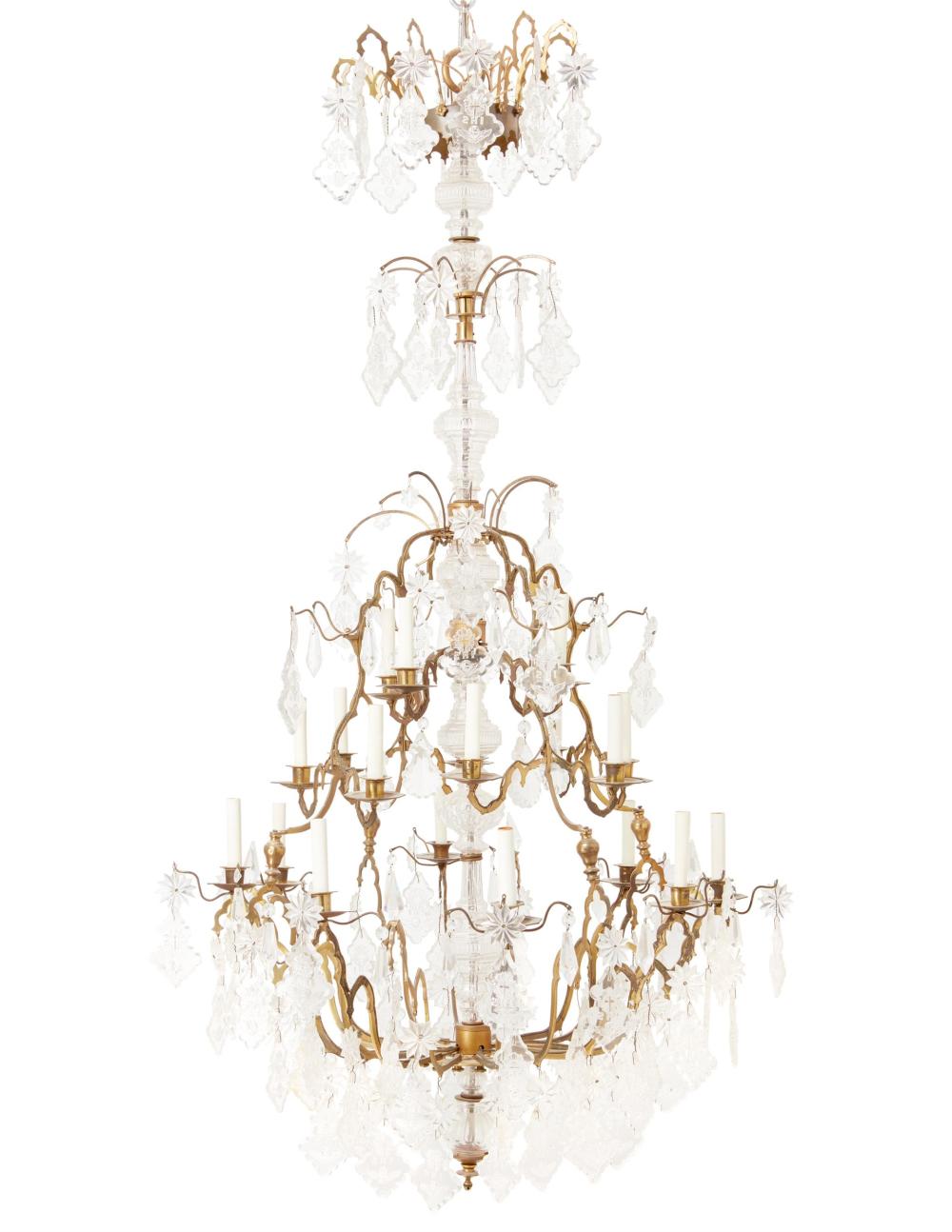 A BRONZE AND CRYSTAL CHANDELIERA