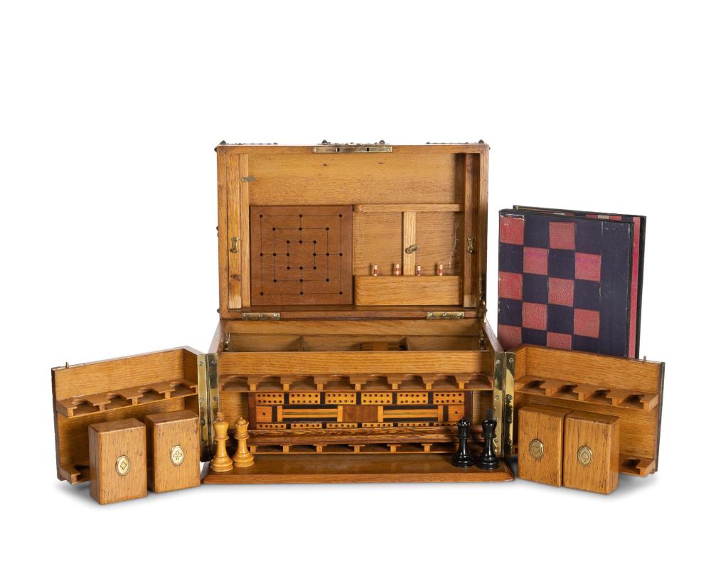 A CONTINENTAL OAK GAMING BOXA Continental 34403a