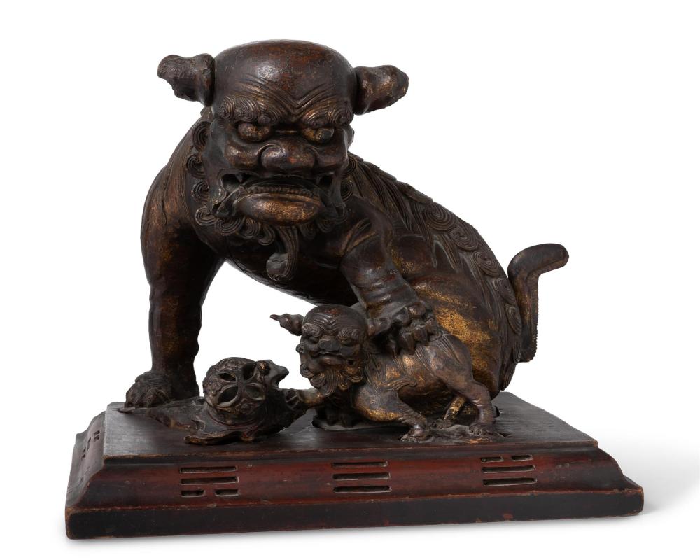 A CHINESE CARVED WOODEN GUARDIAN 344075