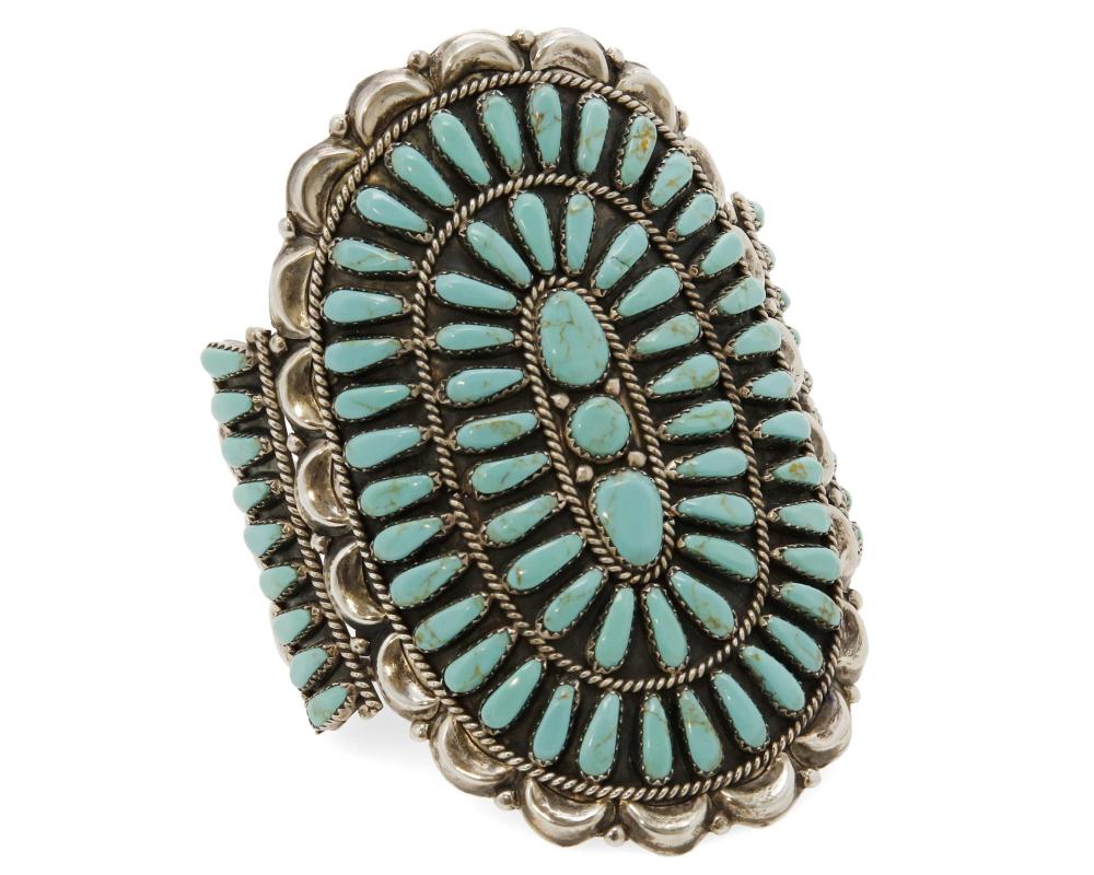 A LARGE CLUSTER SET TURQUOISE AND