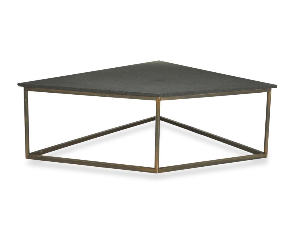 A GEOMETRIC STONE COFFEE TABLE  344393