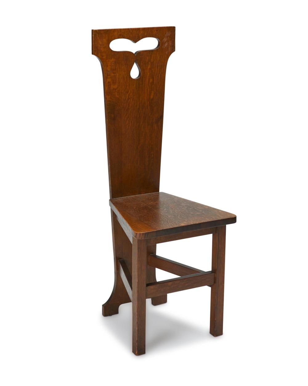 AN ARTS & CRAFTS OAK HALL CHAIR, BY