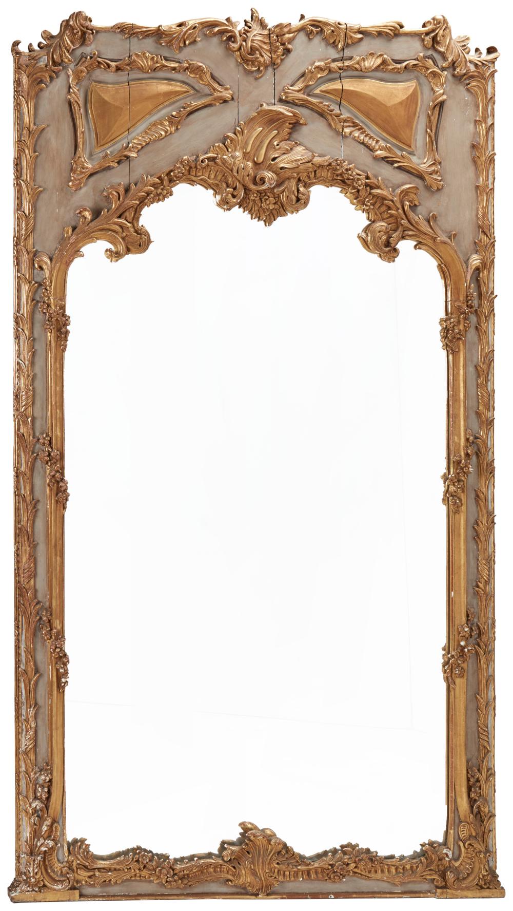 A FRENCH CARVED GILTWOOD WALL MIRRORA 344500