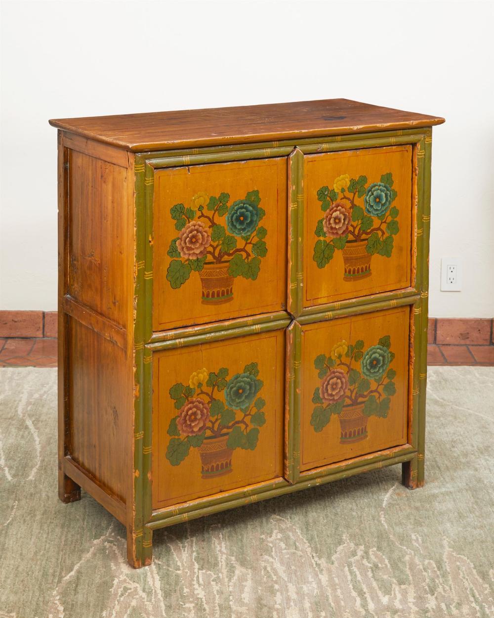 A CHINESE-STYLE PAINTED WOOD CABINETA