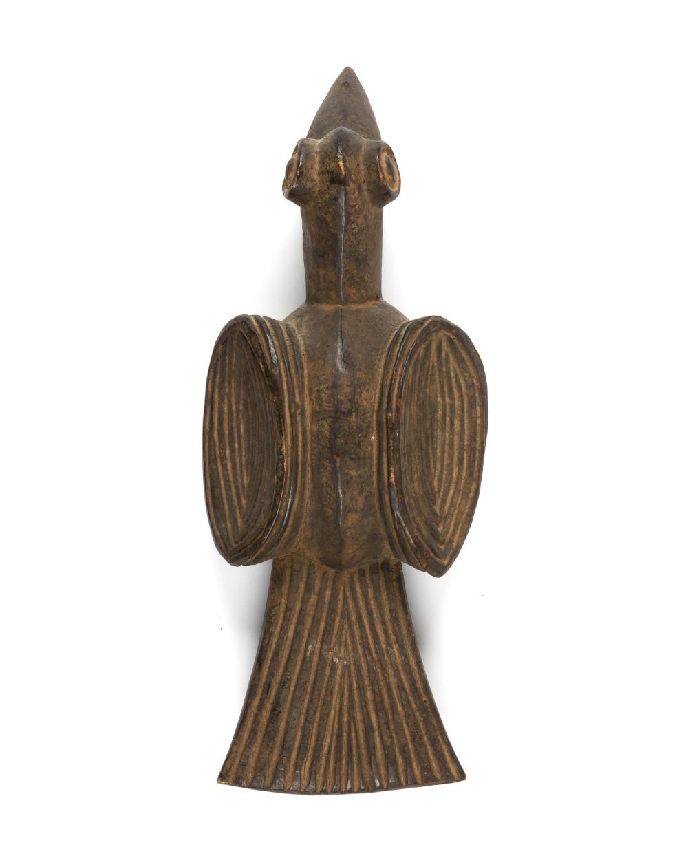 A CAMEROONIAN CARVED WOOD BIRD 34469c