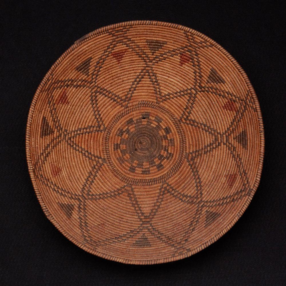 A LARGE POLYCHROME APACHE BASKETA