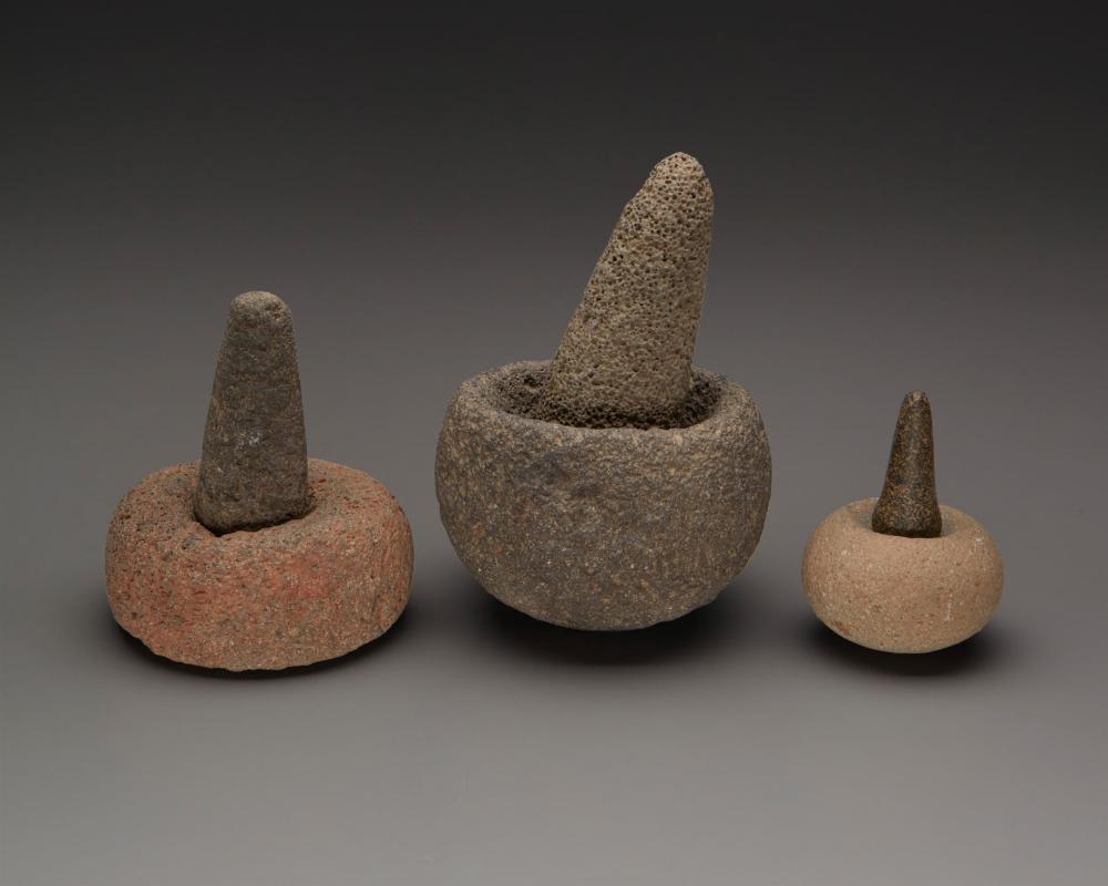 A GROUP OF SMALL STONE MORTARS AND PESTLESA