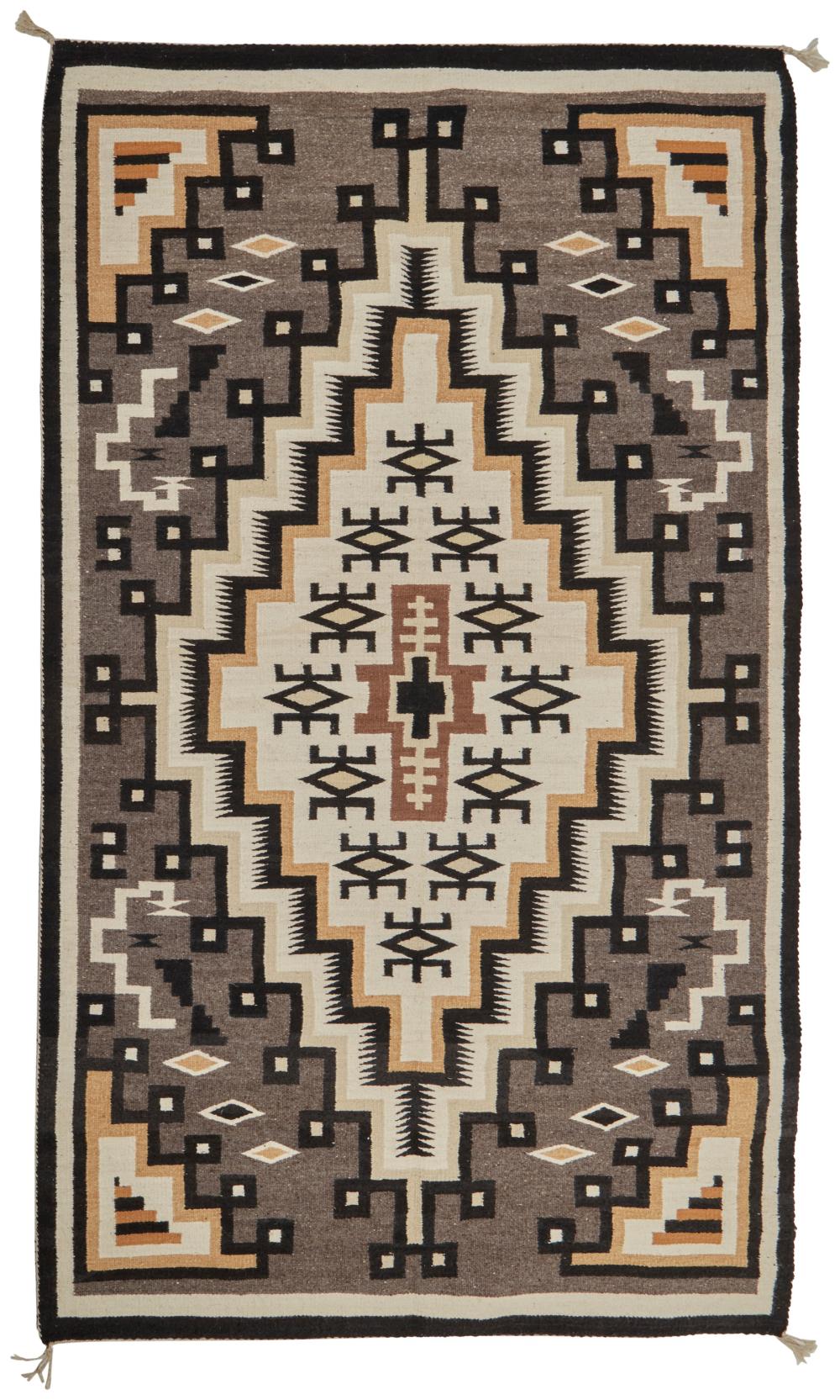 A NAVAJO TWO GREY HILLS RUG WOVEN
