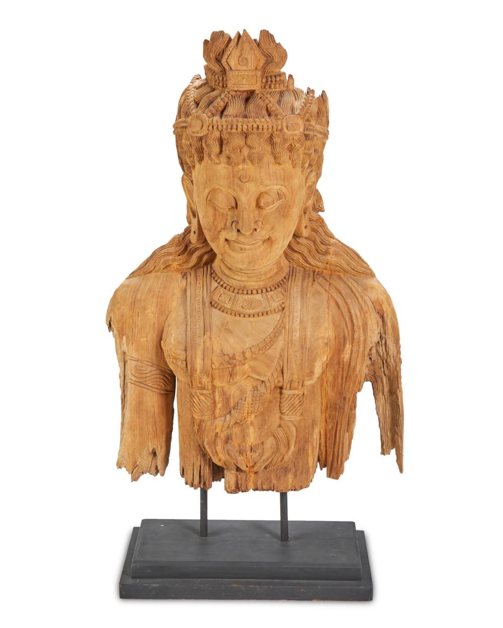 AN INDONESIAN CARVED WOOD DEITYAn 34496c