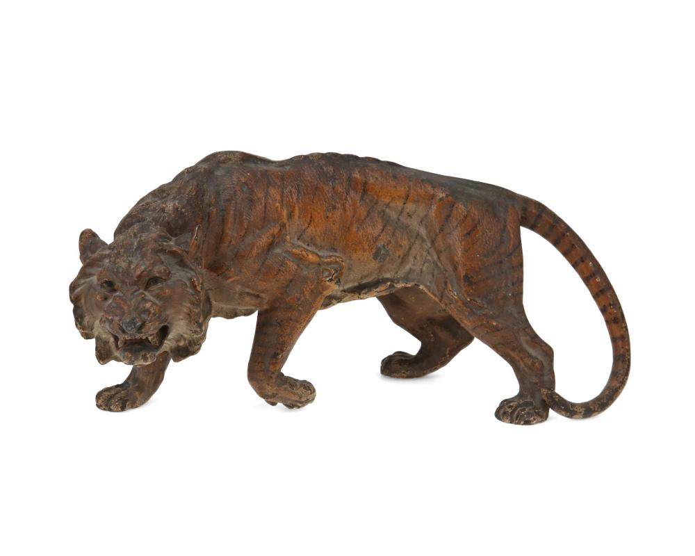 A COLD PAINTED METAL TIGERA cold painted 344978