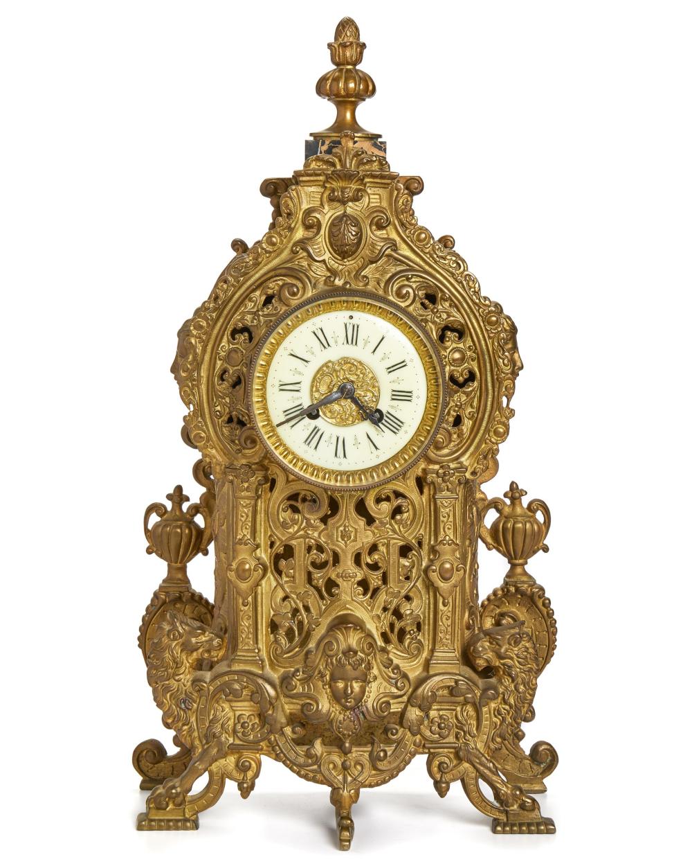 A FRENCH GILT-BRONZE MANTLE CLOCKA