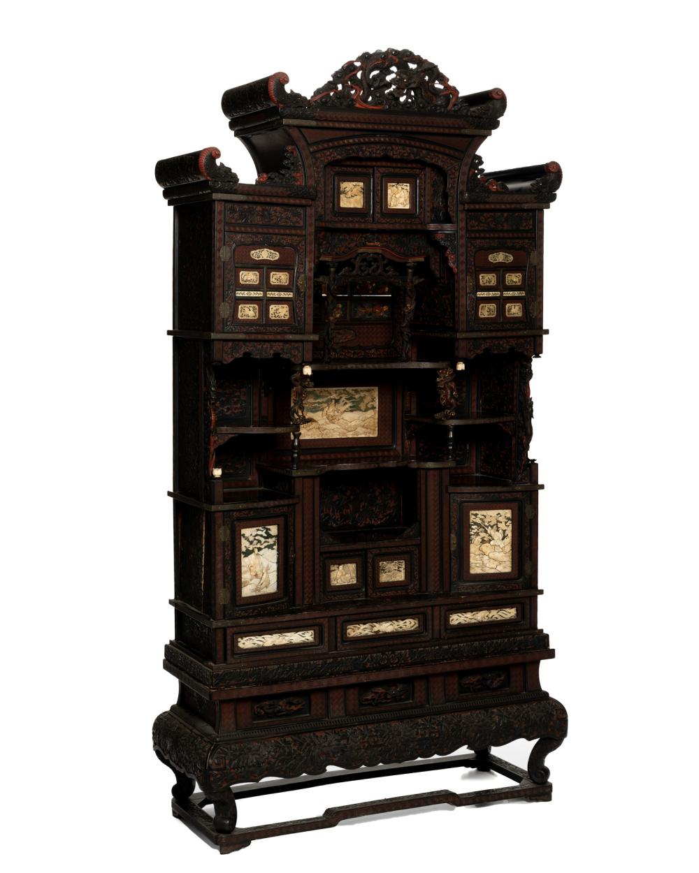 A JAPANESE CARVED HARDWOOD CABINET 344a44