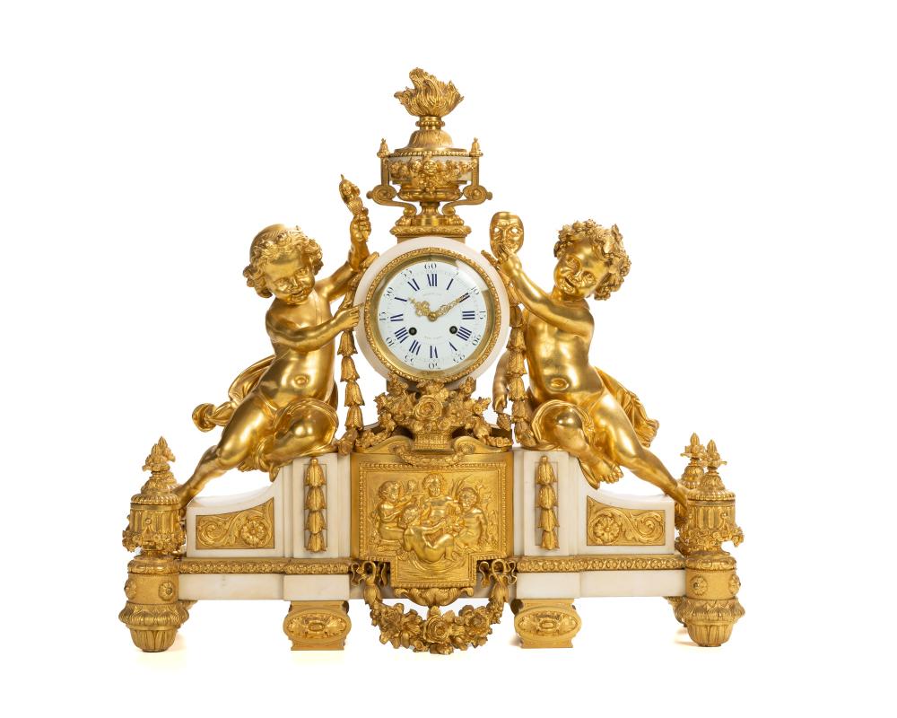 A FRENCH GILT-BRONZE AND MARBLE MANTEL