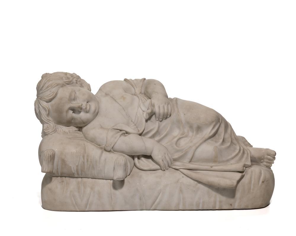 A FRENCH CARVED WHITE MARBLE RECLINING