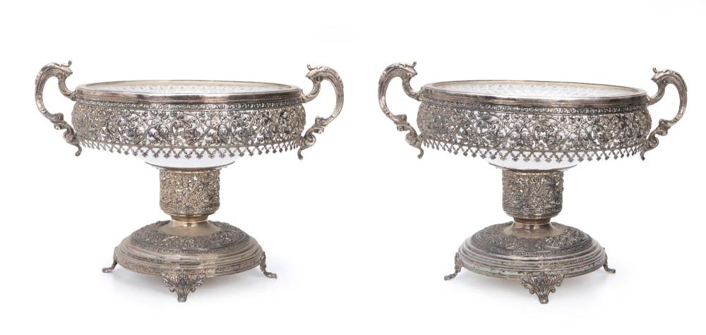 A PAIR OF GLASS AND SILVER PLATE