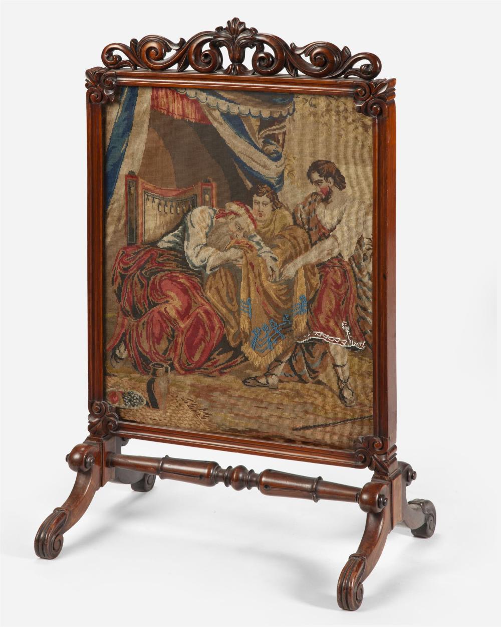 AN ENGLISH FIRE SCREEN WITH FIGURAL