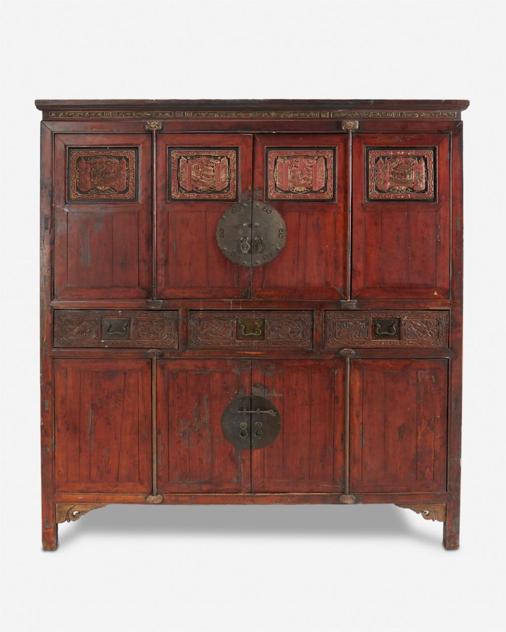 A CHINESE CARVED WOOD CABINETA