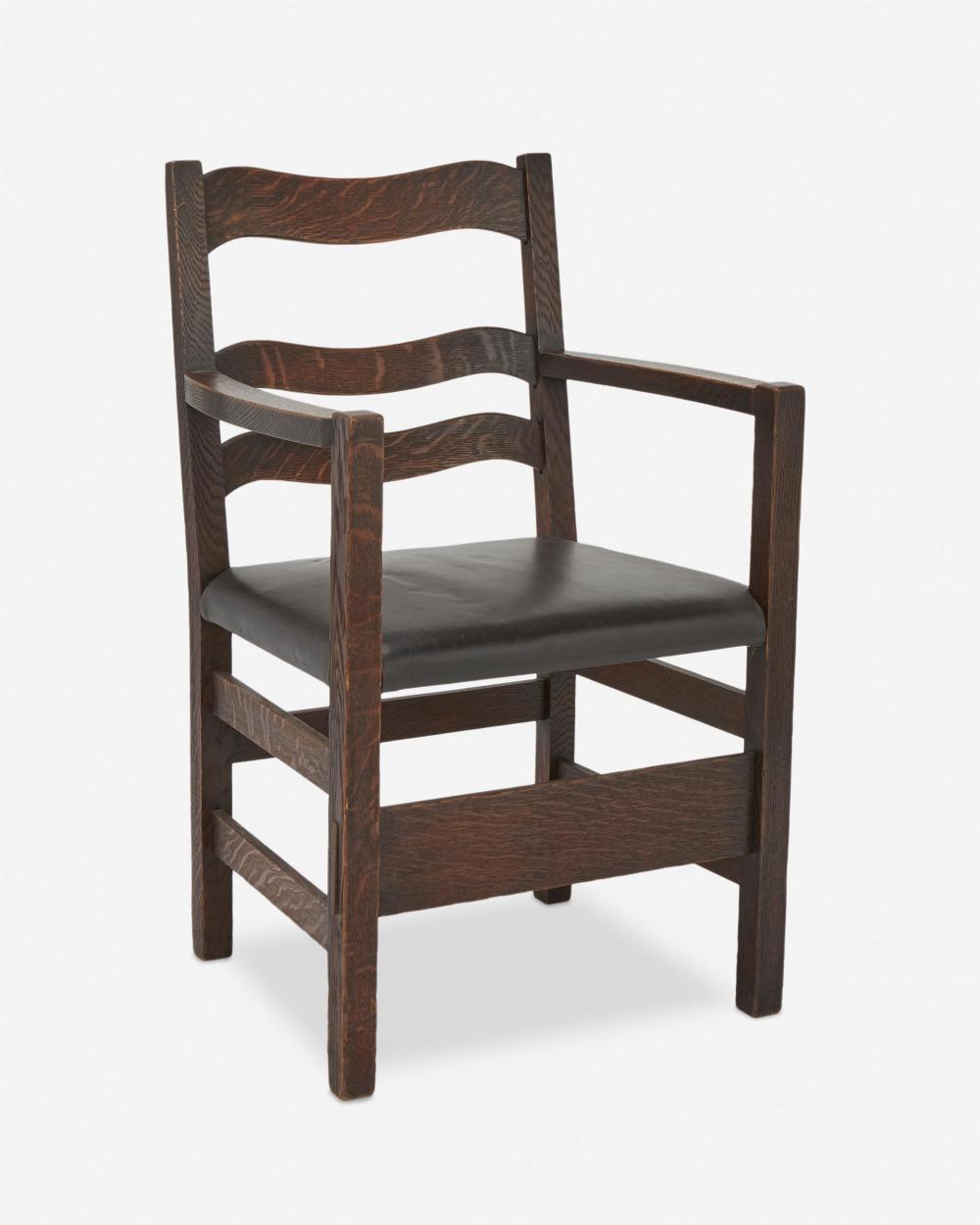 A STICKLEY BROTHERS FUMED OAK ARMCHAIRA