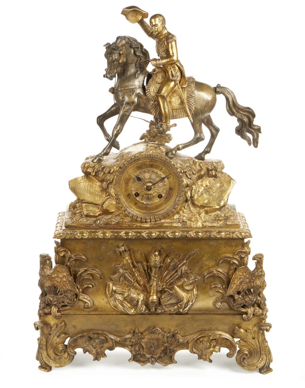 A FRENCH GILT-BRONZE CLOCK OF NAPOLEON