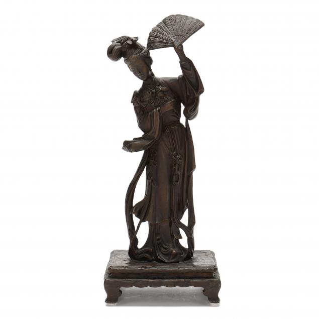 A CHINESE BRONZE FIGURE OF GUANYIN 345281