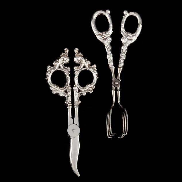 TWO PAIRS OF STERLING SILVER HANDLED