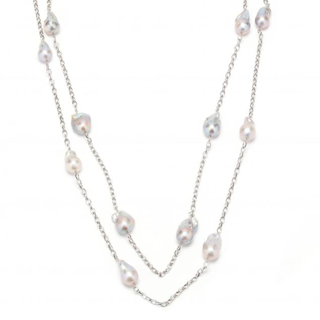 TWO WHITE GOLD AND BAROQUE PEARL 345439