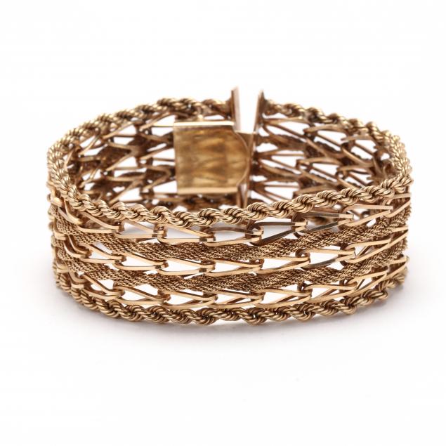 GOLD STRAP BRACELET Designed with 34544c