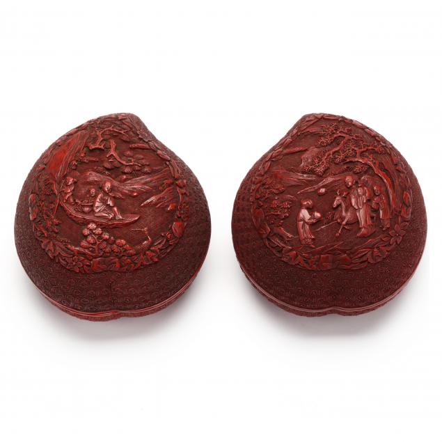 A PAIR OF CHINESE CARVED RED CINNABAR