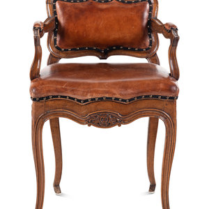 A Louis XV Leather-Upholstered