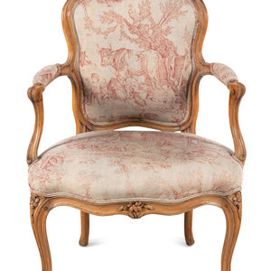 A Louis XV Carved Fruitwood Fauteuil By 345660