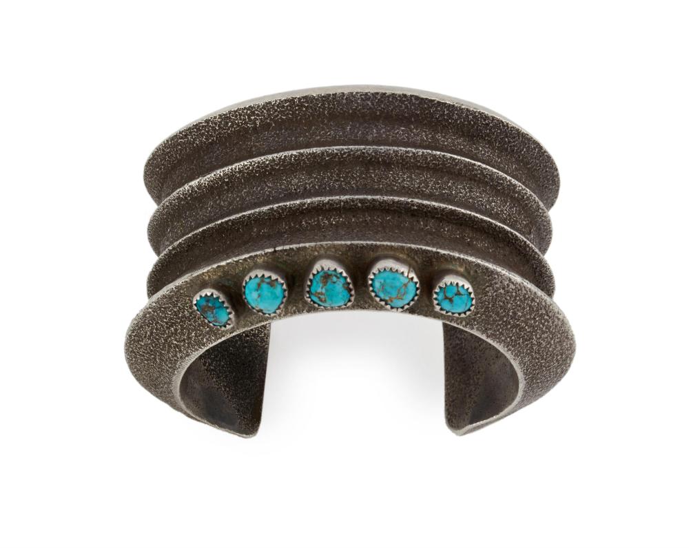 A NAVAJO TUFA CAST SILVER BRACELETA 343022