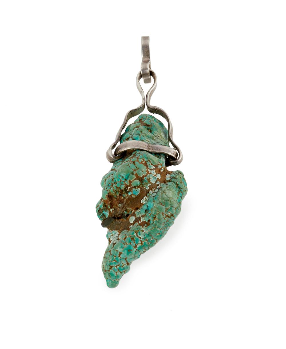 A LARGE TURQUOISE NUGGET PENDANTA large