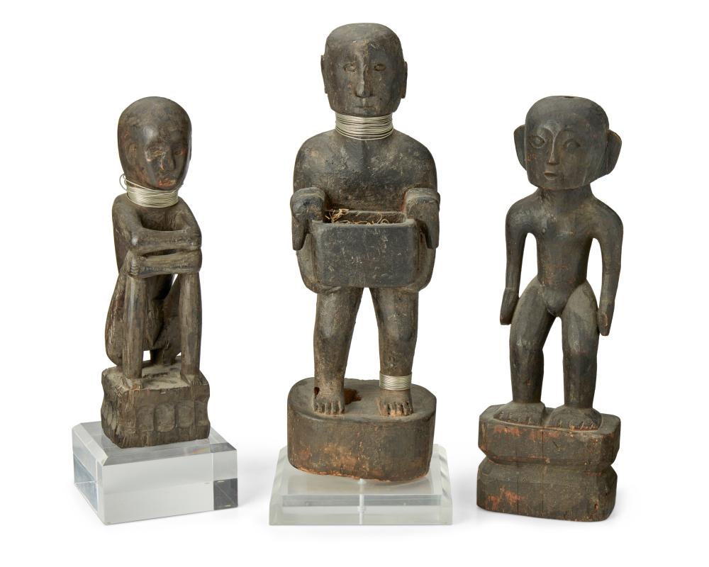 THREE IFUGAO CARVED WOOD FIGURESThree 34320f