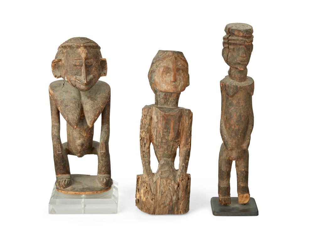 THREE AFRICAN CARVED WOOD FIGURESThree