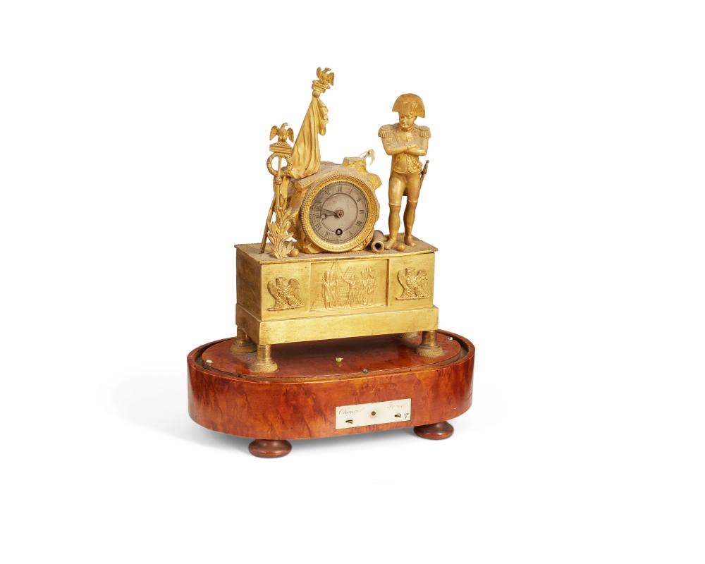 A FRENCH NAPOLEON MANTEL CLOCKA