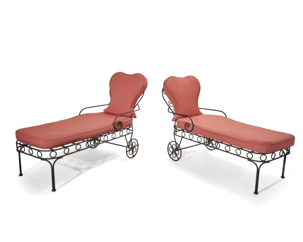 A PAIR OF WROUGHT IRON CHAISE LOUNGESA 343348